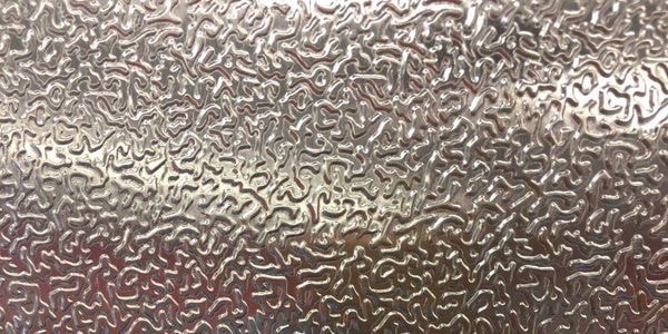 Stacked metal sheets in storage